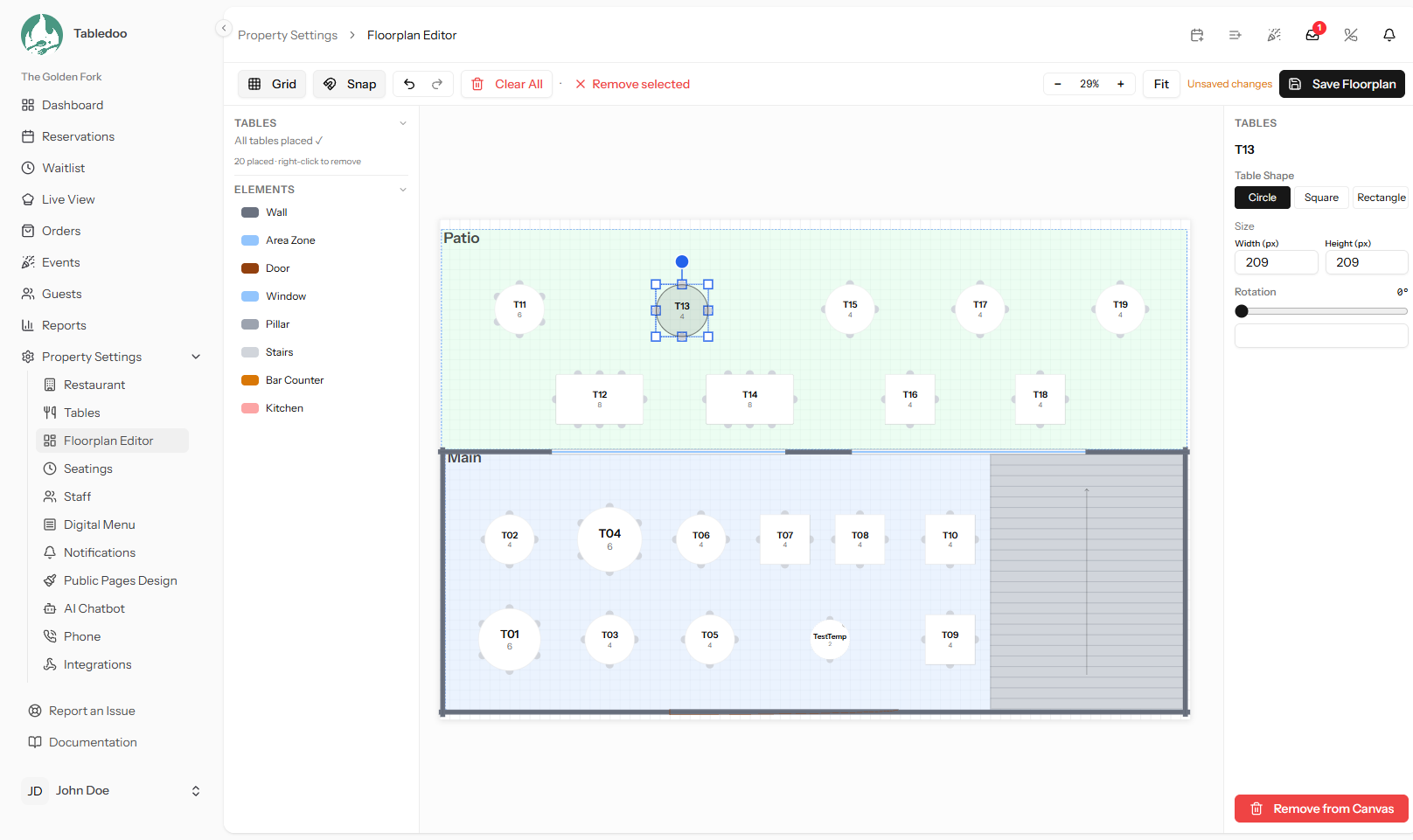 The floor plan editor with the element palette on one side and tables arranged on the canvas